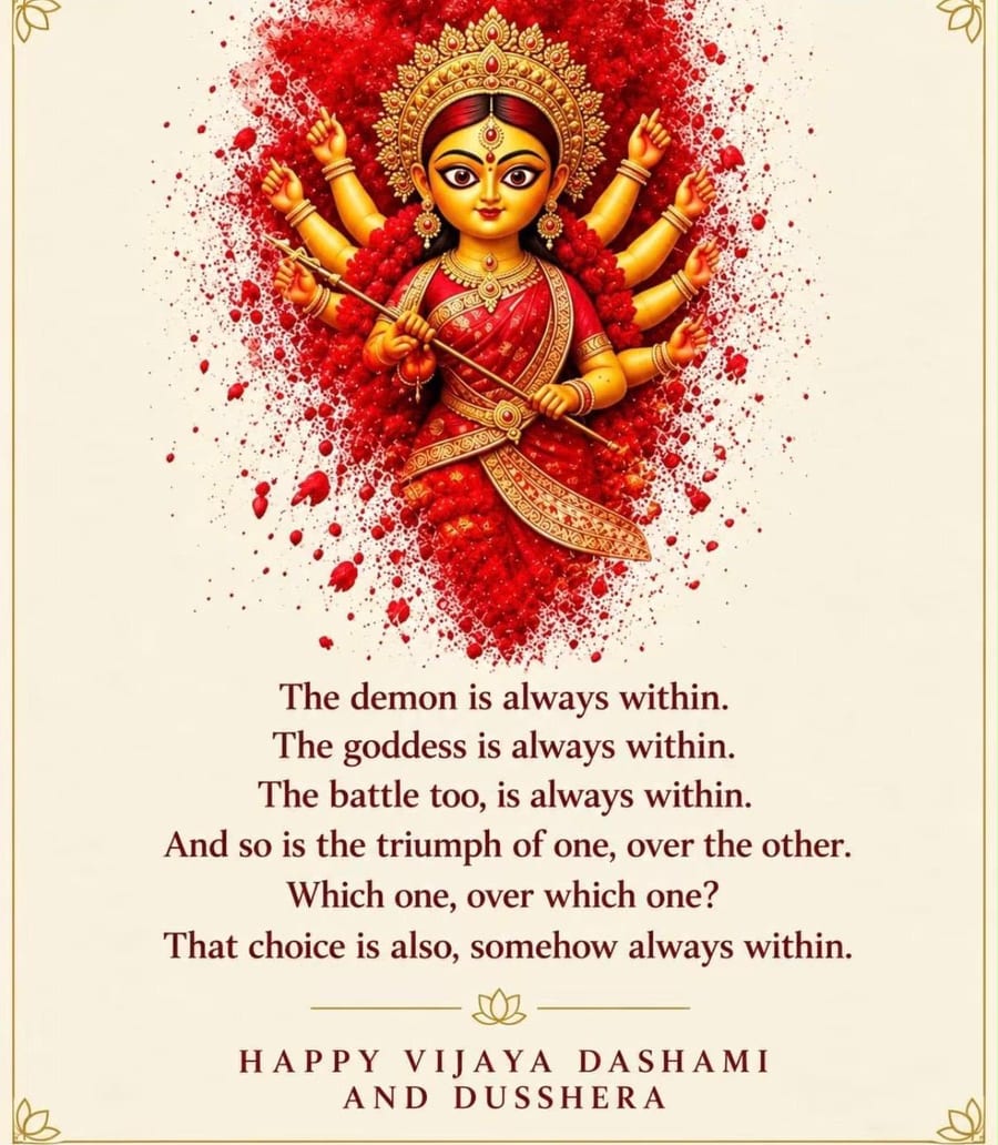 An illustrated eight-armed Durgā in a red sari and golden crown, holding a trident, rising out of a burst of red kumkum powder on a cream card with a thin gold border. Below her, six lines of verse — the demon, the goddess and the battle are always within — and the words Happy Vijaya Dashami and Dusshera.